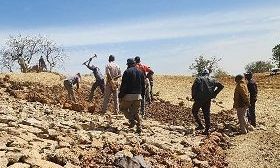 Wateropslag & moestuin in Burkina Faso